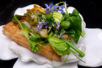 Spring vegetable and flower savory tart with goat cheese  