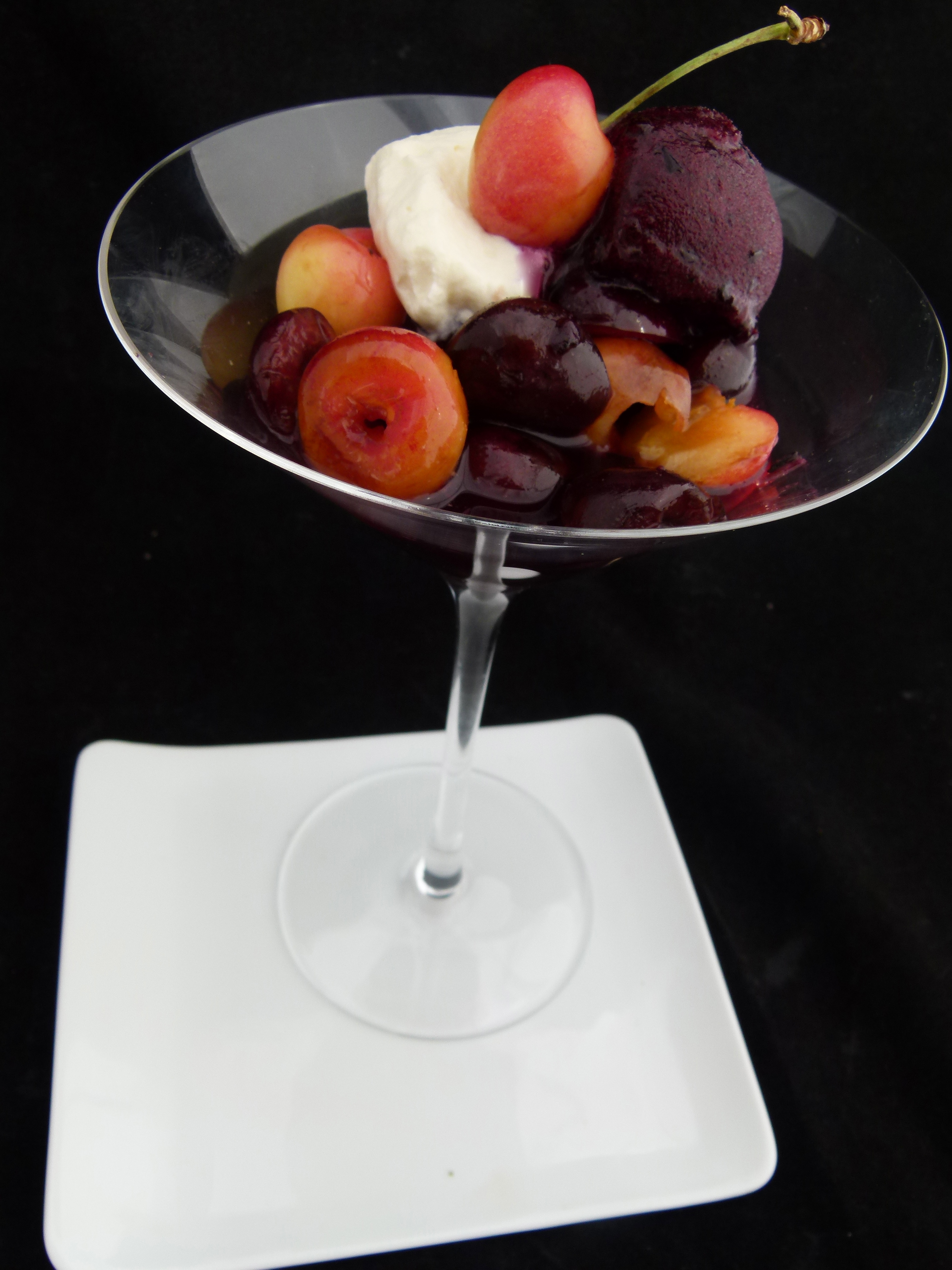 marinated cherries with blueberry sorbet and cherry brandy whipped cream