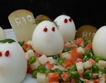 Deviled eggs with Devil Eyes RIP sign 