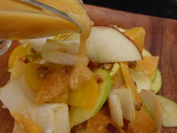 persimmon, endive, apple, and beet salad with creamy dressing