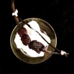 roasted blackberries on a vanilla pod bow with vanilla seed ice cream and fresh violets (April 1, 2012)