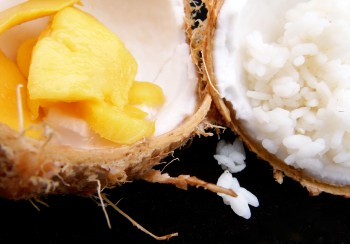 open coconut with mango for smoothie by chef morgan