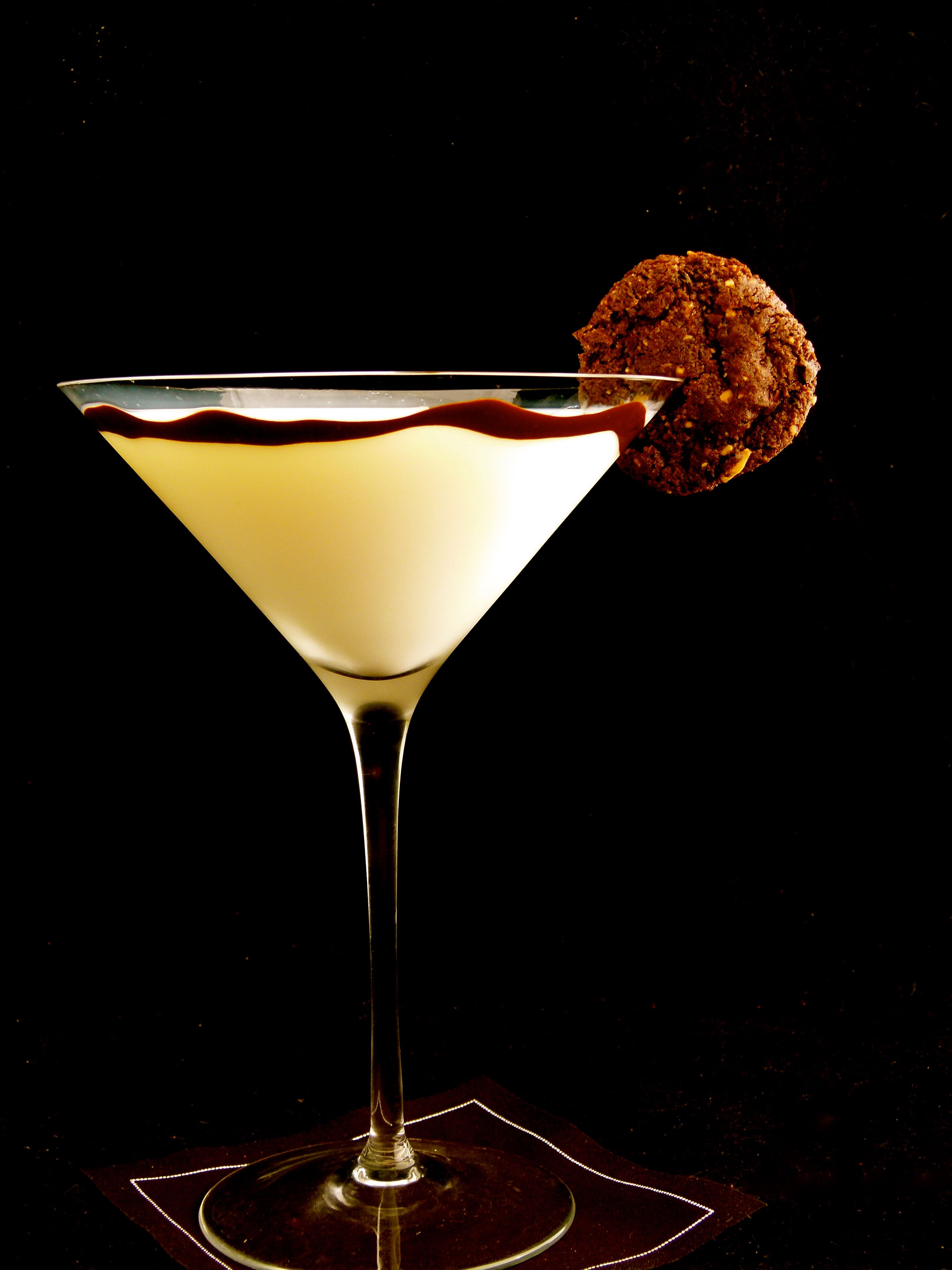 crunchy chocolate and espresso almond cookies in milk martini glass