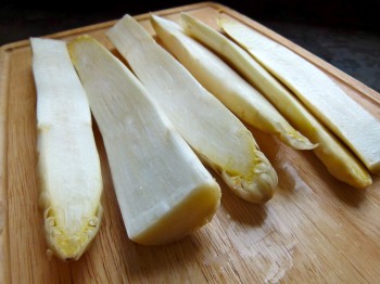 White asparagus sliced in half