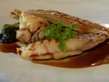 chicken served with romaine lettuce stuffed with mushrooms and artichokes