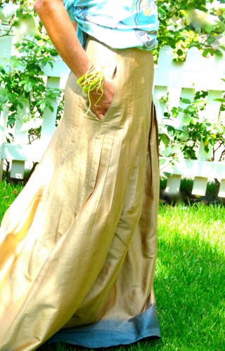 girl in gown with bracelet of zucchini spaghetti 