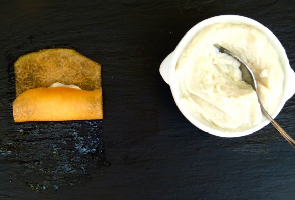 sliced cantaloupe and ricotta cheese filling rolling up