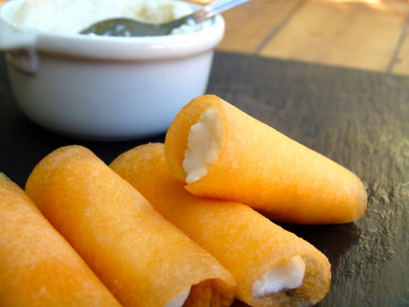 sliced cantaloupe and ricotta cheese filling cannoli