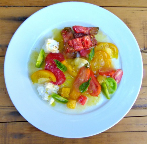 melange of garden heirloom tomatoes with burrata and whipped tomato purée