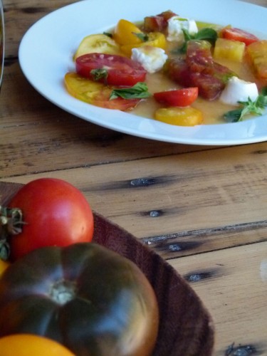 melange of garden heirloom tomatoes with burrata and whipped tomato purée