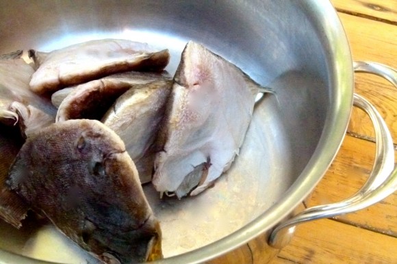 Fish parts in bowl for fish stock
