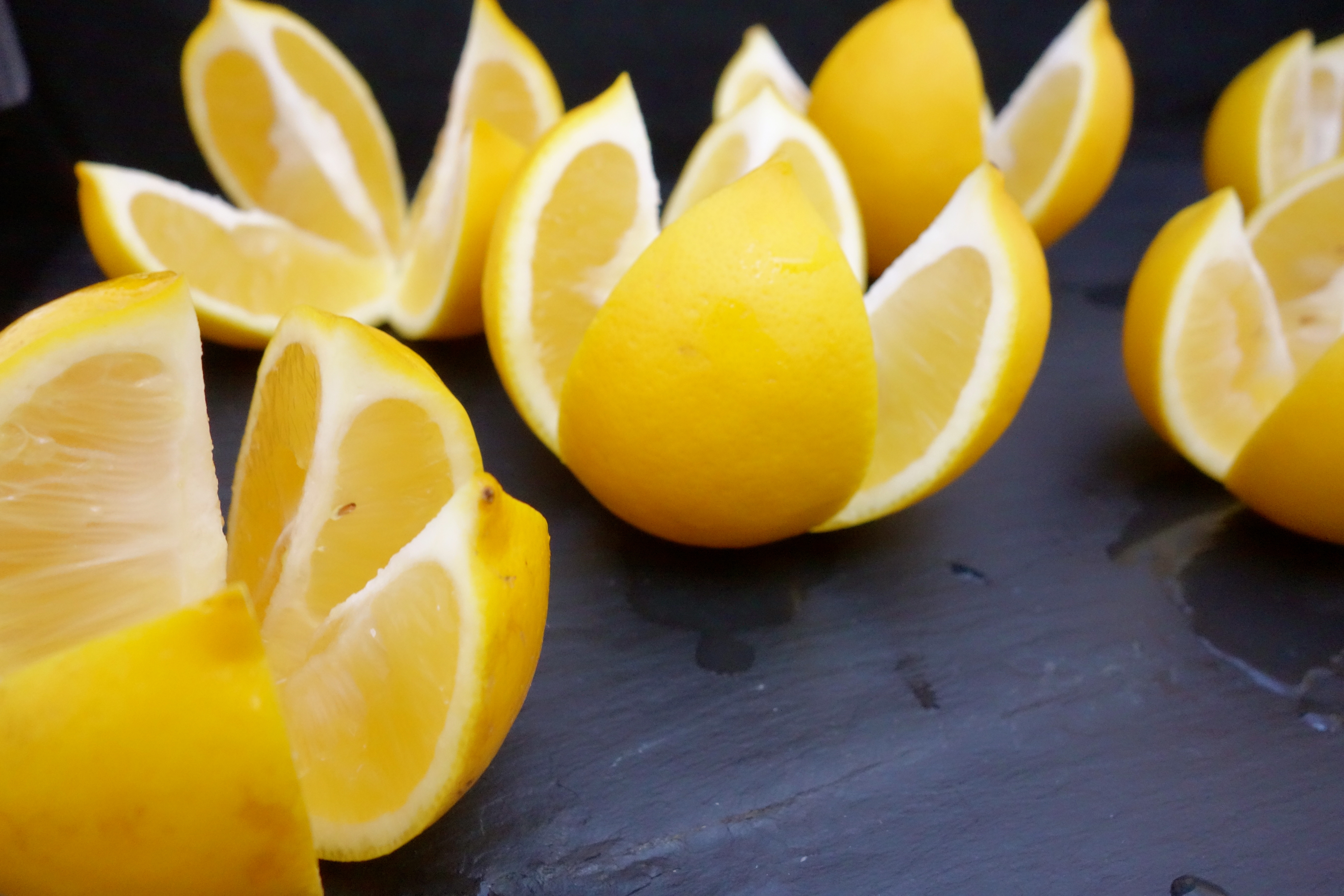 Lemons cut into wedges - link to markets los angeles