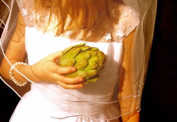 girl in wedding dress with artichoke bouquet 