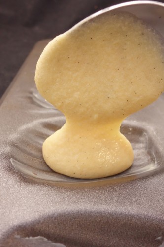batter in a Madeleine baking pan for vanilla bean Madeleines for valentines day